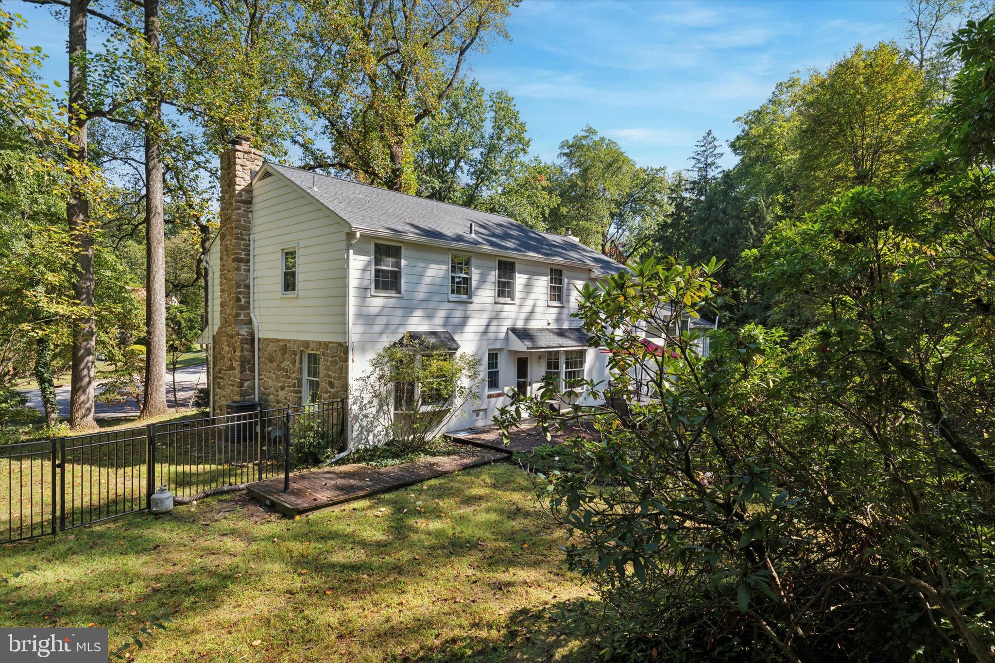 711 Custis Road Glenside, PA 19038 - Photo 41 of 53 a view of a house with a yard potted plants and large tree