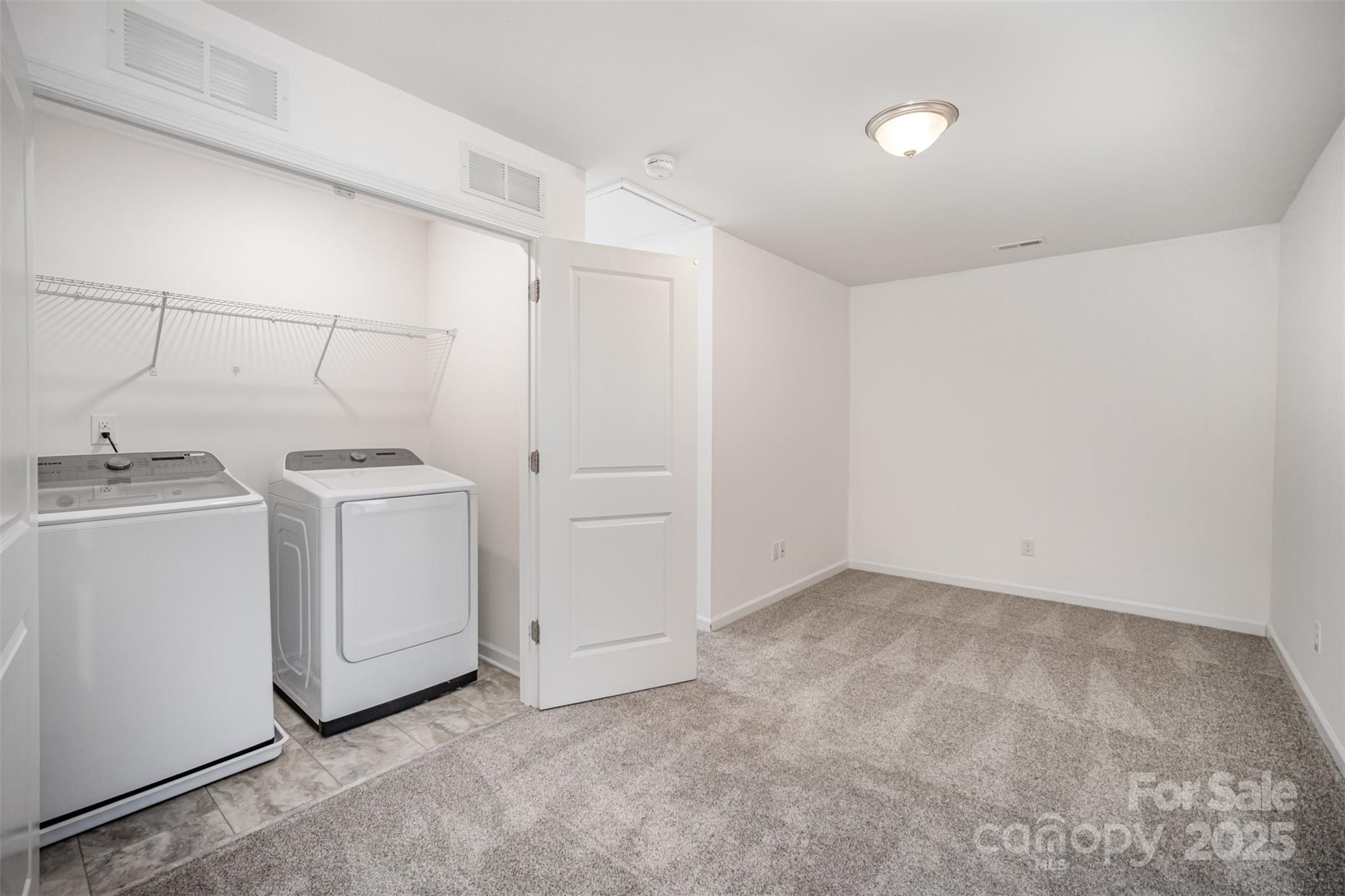 558 Dulaney Drive Tega Cay, SC 29708 - Photo 16 of 30 a utility room with dryer and washer