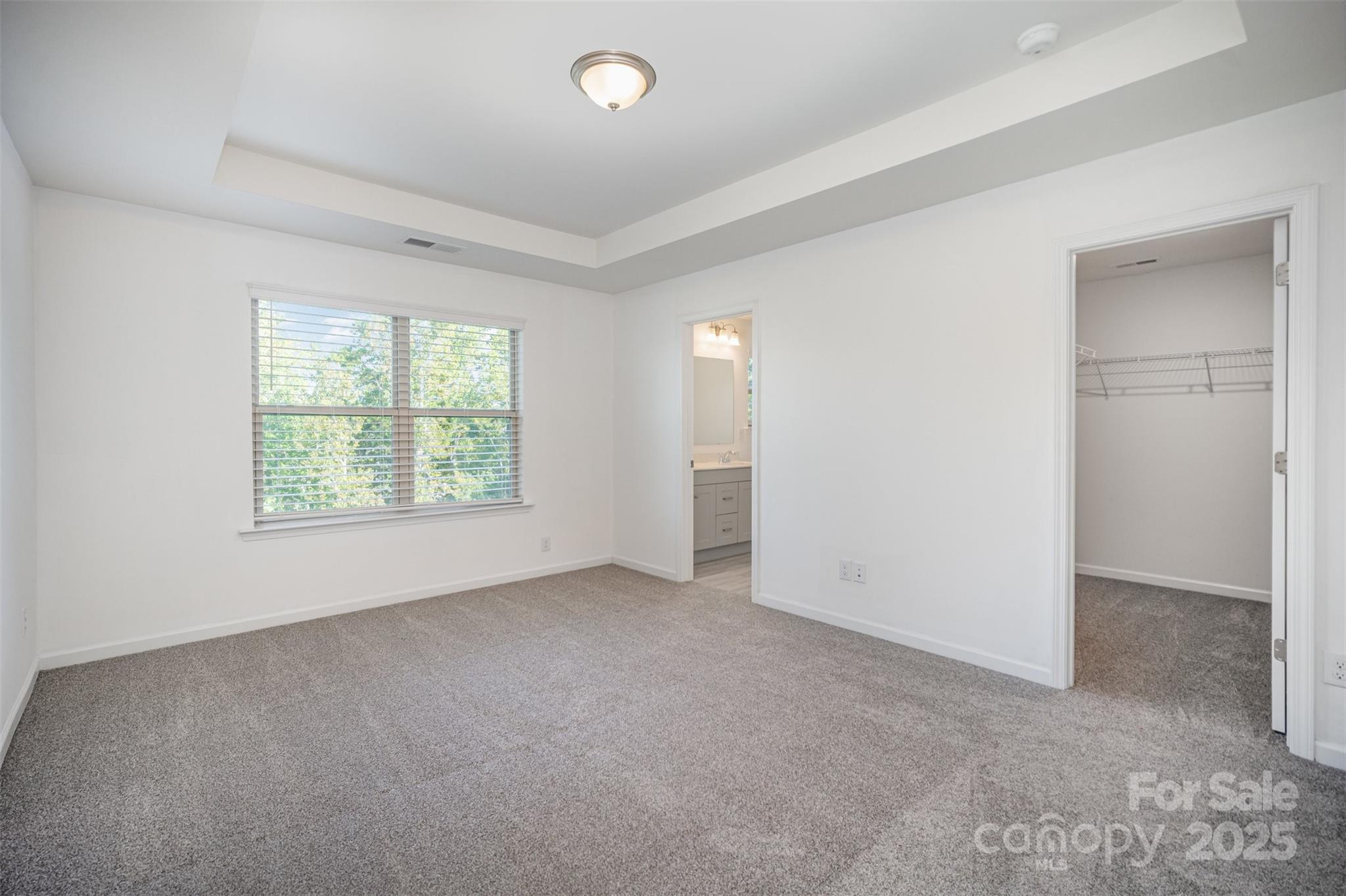 558 Dulaney Drive Tega Cay, SC 29708 - Photo 19 of 30 an empty room with windows and closet
