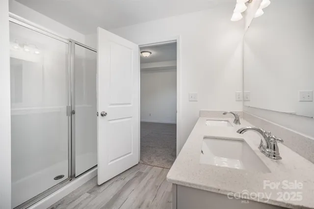 a view of balcony with wooden floor