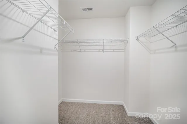 a balcony with trees in the background