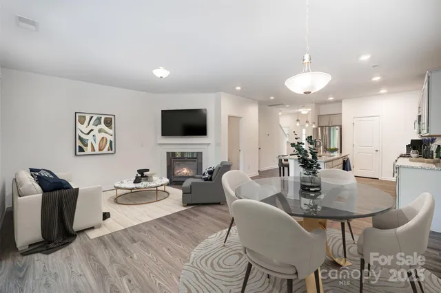 a view of kitchen with wooden floor