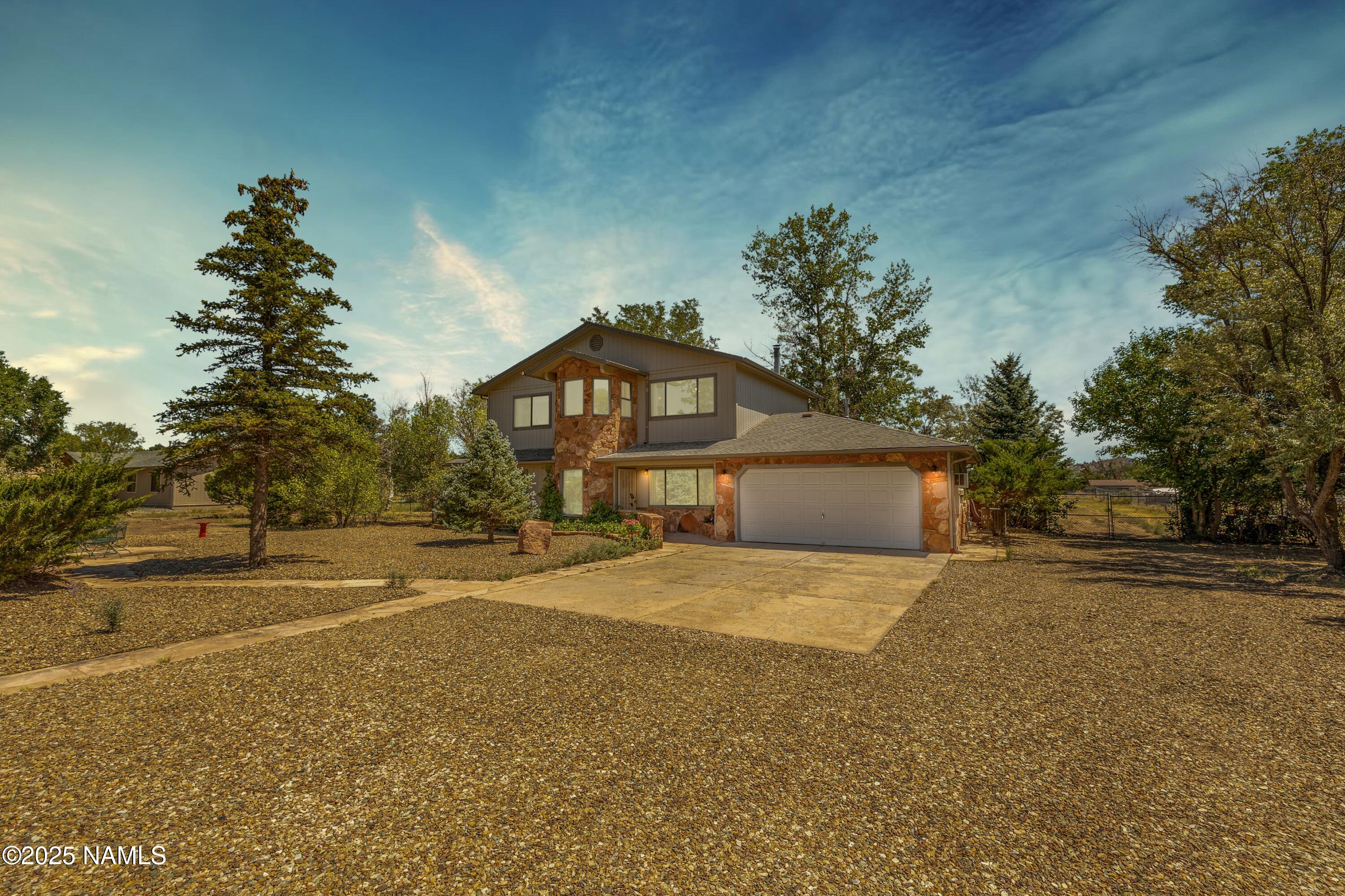 9655 Pioneer Valley Road Flagstaff, AZ 86004 - Photo 50 of 51 Front at Dusk