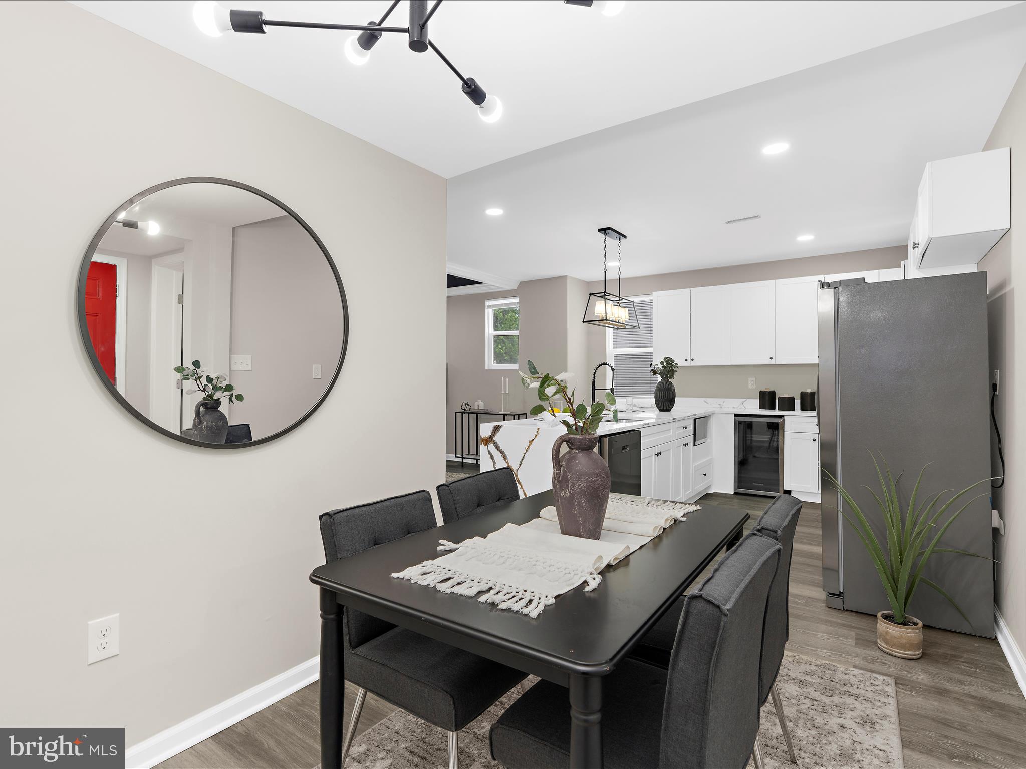 3708 Mohawk Avenue Baltimore, MD 21207 - Photo 16 of 54 a view of a dining room with furniture