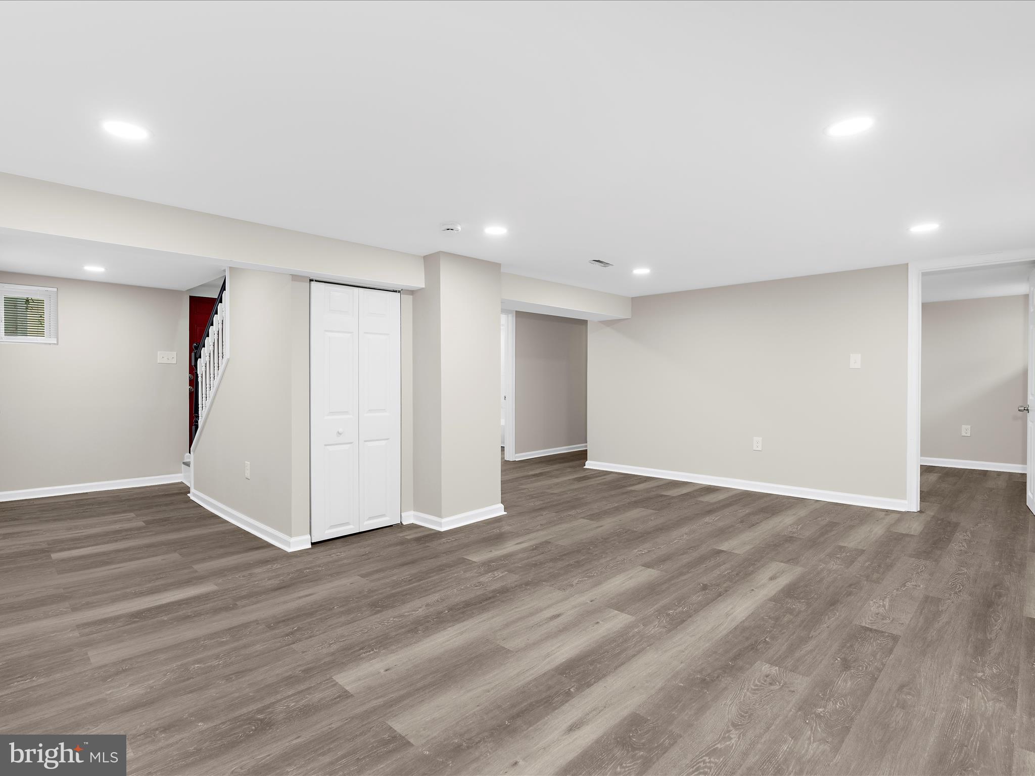 3708 Mohawk Avenue Baltimore, MD 21207 - Photo 39 of 54 a view of an empty room with wooden floor