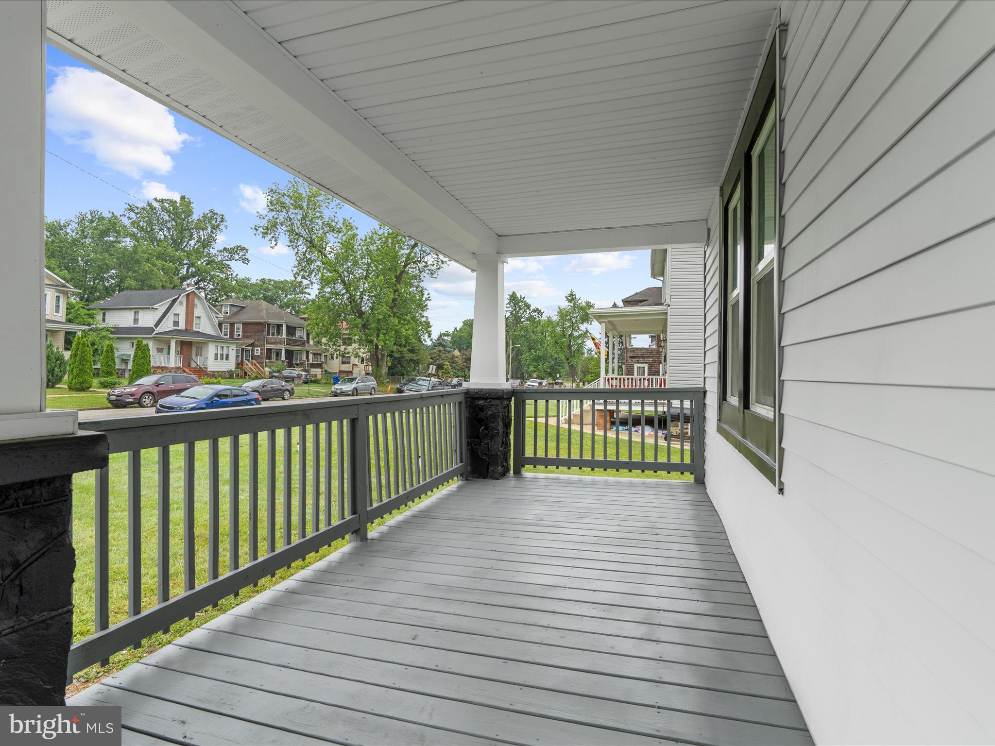 3708 Mohawk Avenue Baltimore, MD 21207 - Photo 4 of 54 a view of a balcony with wooden floor