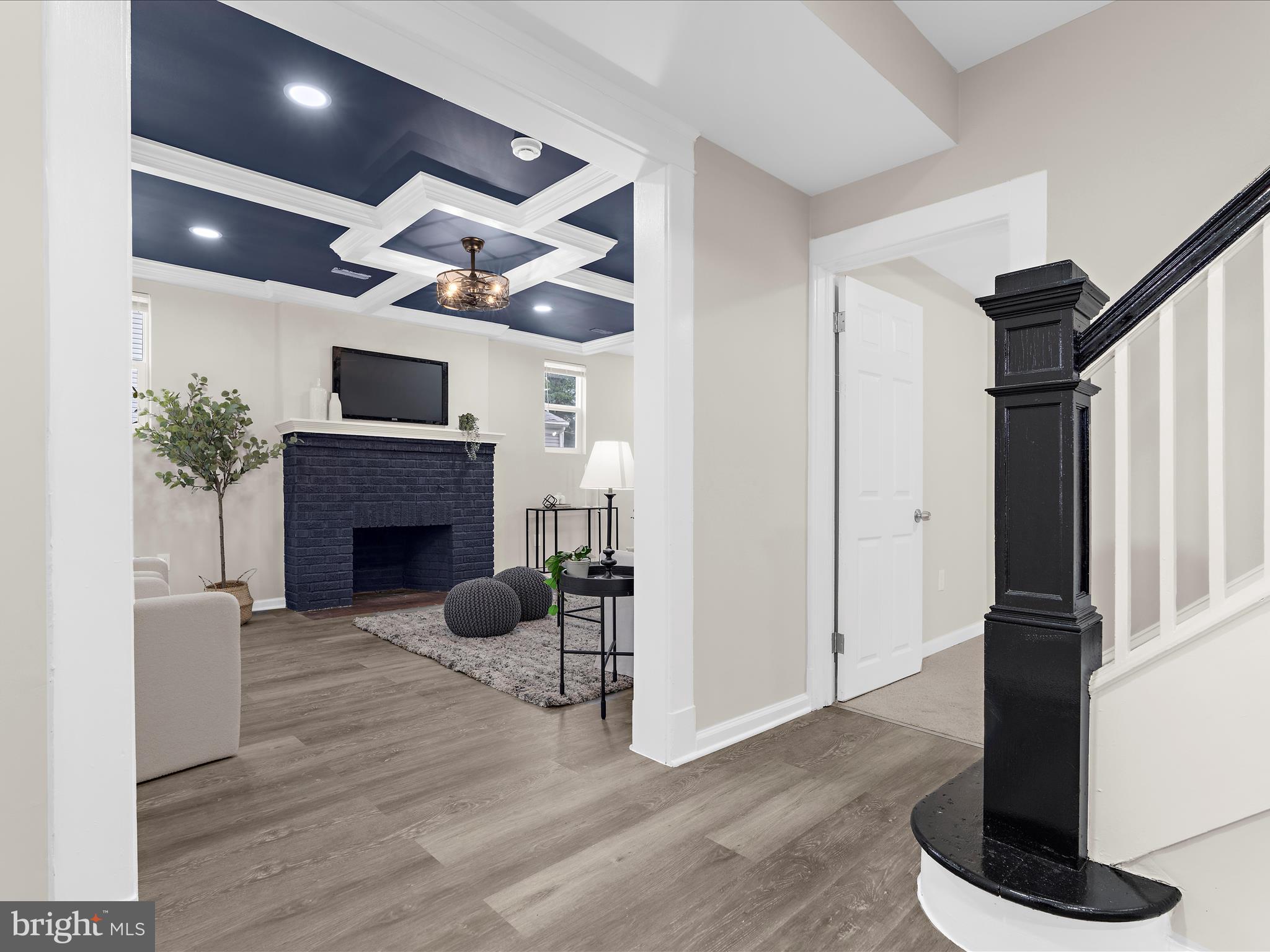 3708 Mohawk Avenue Baltimore, MD 21207 - Photo 6 of 54 a view of a livingroom with furniture and a fireplace