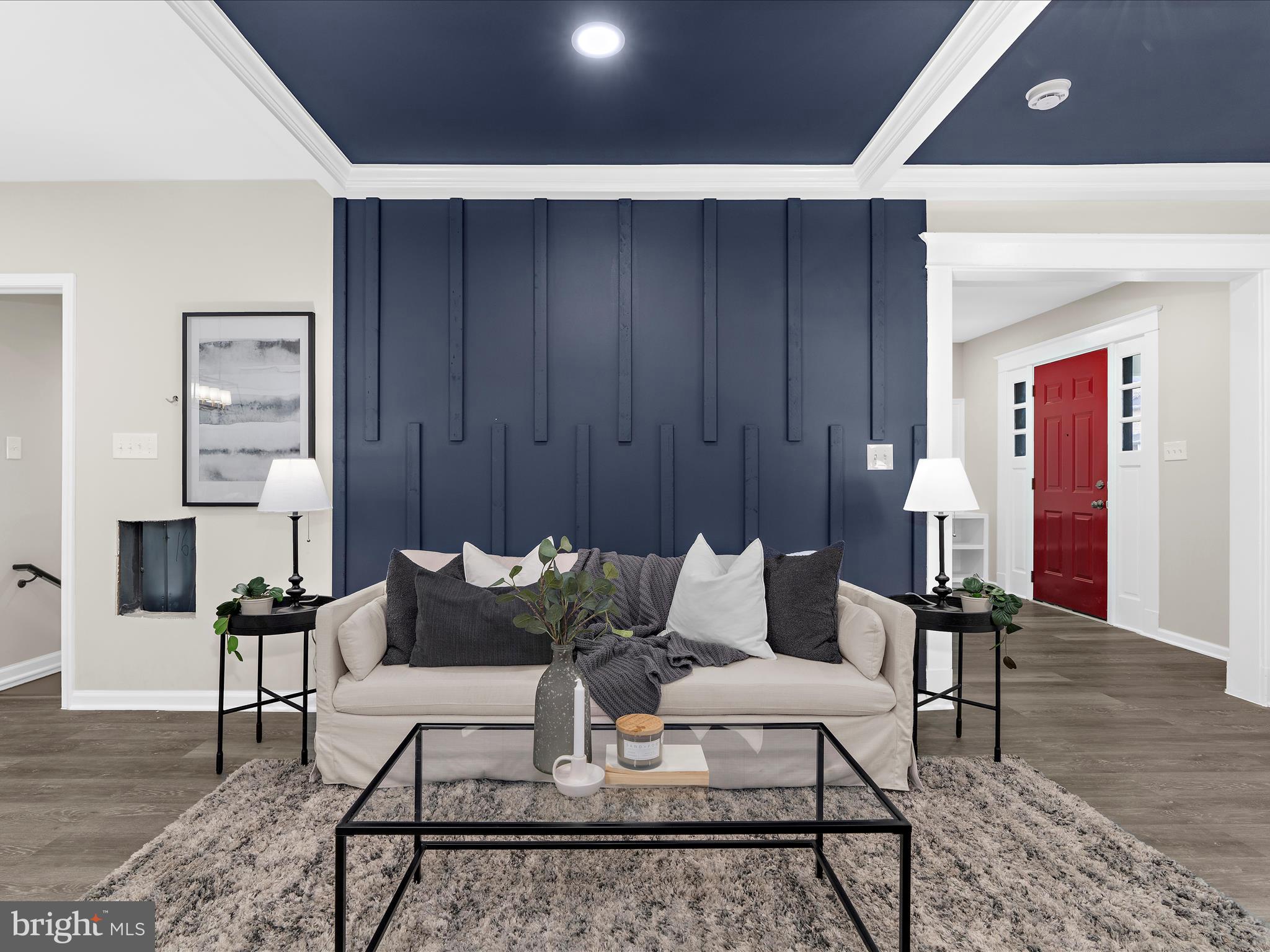 3708 Mohawk Avenue Baltimore, MD 21207 - Photo 9 of 54 a living room with furniture and wooden floor