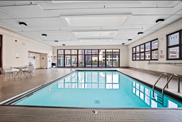a view of a living room and dining room