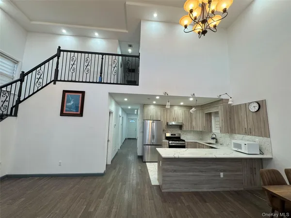 a view of hall way with furniture