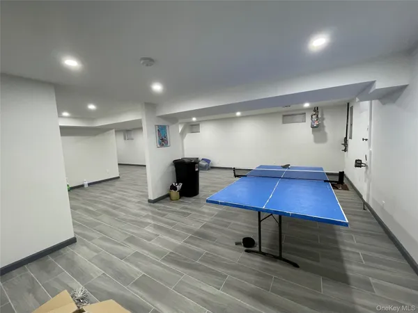 a room with furniture and wooden floor