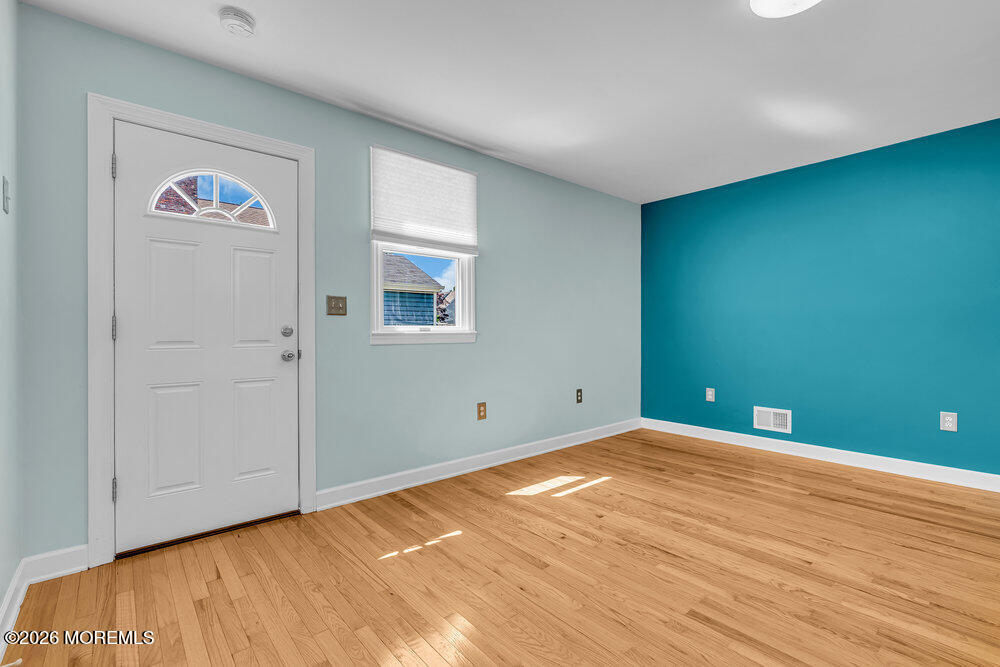 1407 Edgemere Road Wall, NJ 07719 - Photo 13 of 16 a view of an empty room with closet and a window