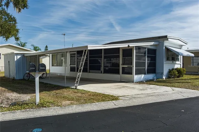a house with trees in the background