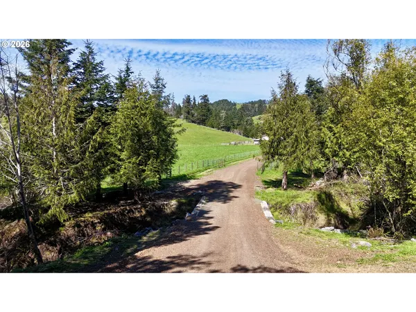 $3,200,000 | 94621 North Bank Rogue River Road, Gold Beach, OR 97444