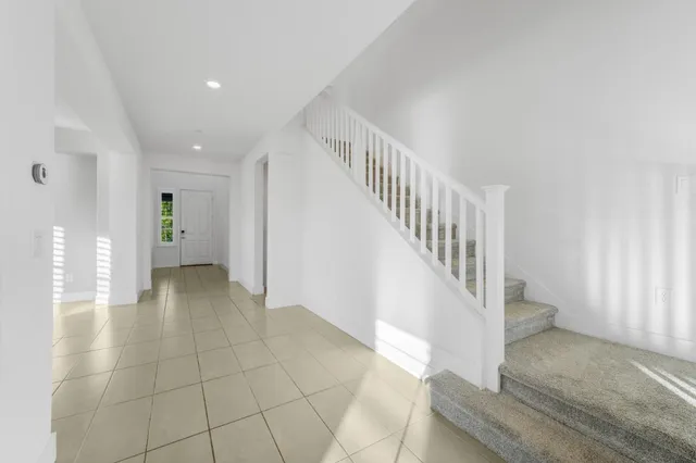 a spacious bathroom with a bathtub and a shower