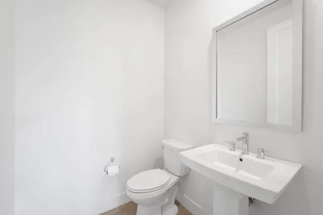 an aerial view of a house with a outdoor space