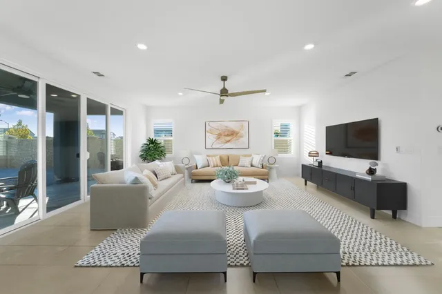 a kitchen with stainless steel appliances granite countertop a sink a counter top space cabinets and stainless steel appliances