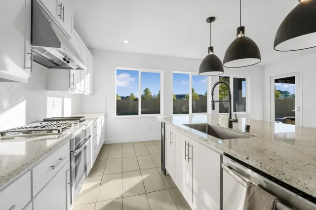 a living room with a couch and a flat screen tv