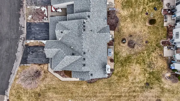 a view of a house with backyard porch and sitting area