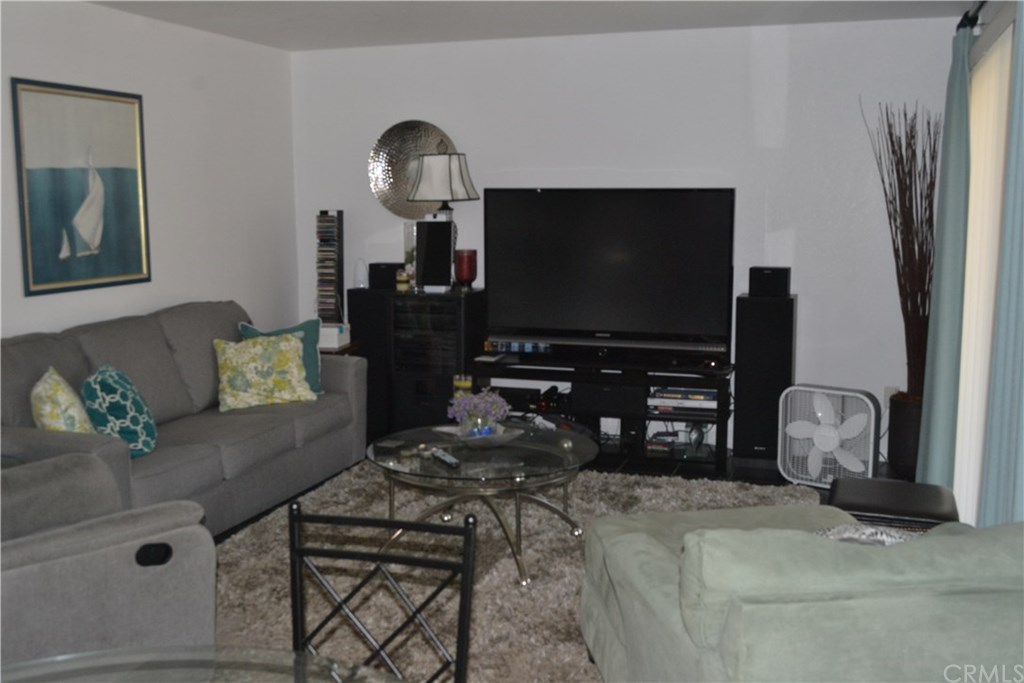15791 Firethorn Road Fontana, CA 92337 - Photo 1 of 1 Family Room with access to patio