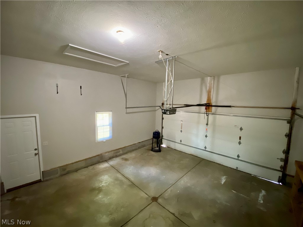 4407 Archer Road Cleveland, OH 44105 - Photo 25 of 34 Sizable garage with extra high ceilings