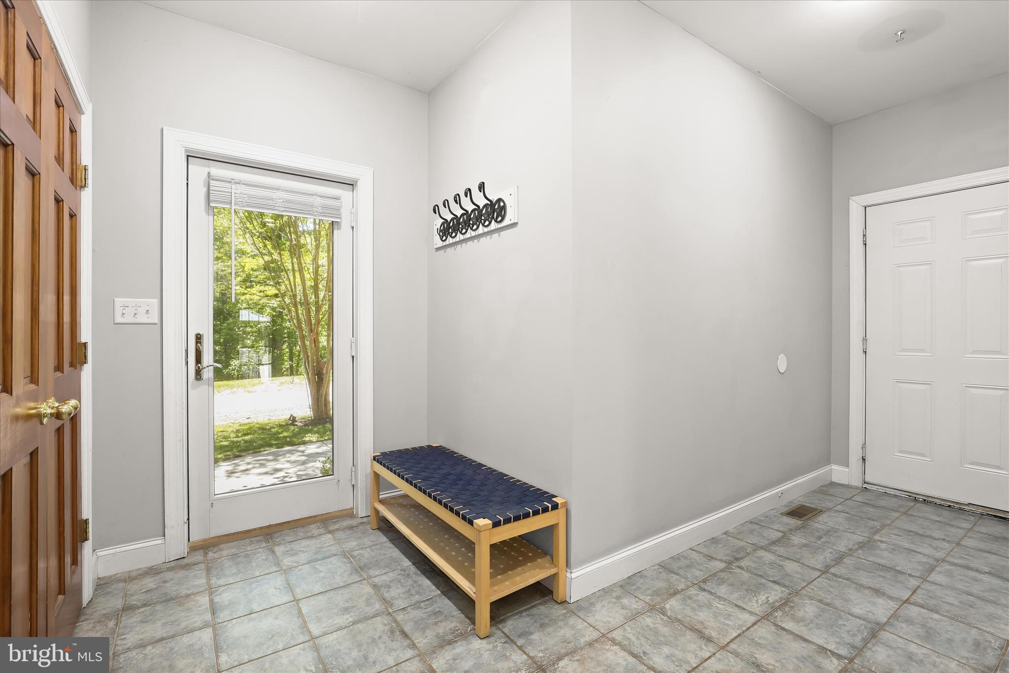 5530 Jim Pickett Road Sykesville, MD 21784 - Photo 26 of 76 Driveway entrance mudroom & garage access