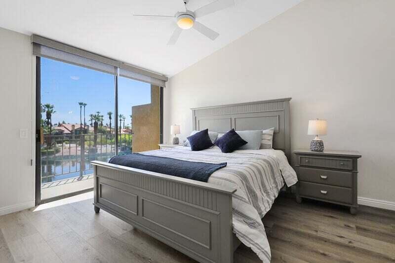 55288 Firestone La Quinta, CA 92253 - Photo 13 of 20 a bedroom with a bed and large window