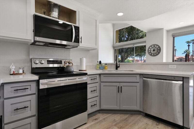 55288 Firestone La Quinta, CA 92253 - Photo 2 of 20 a kitchen with a stove and a microwave