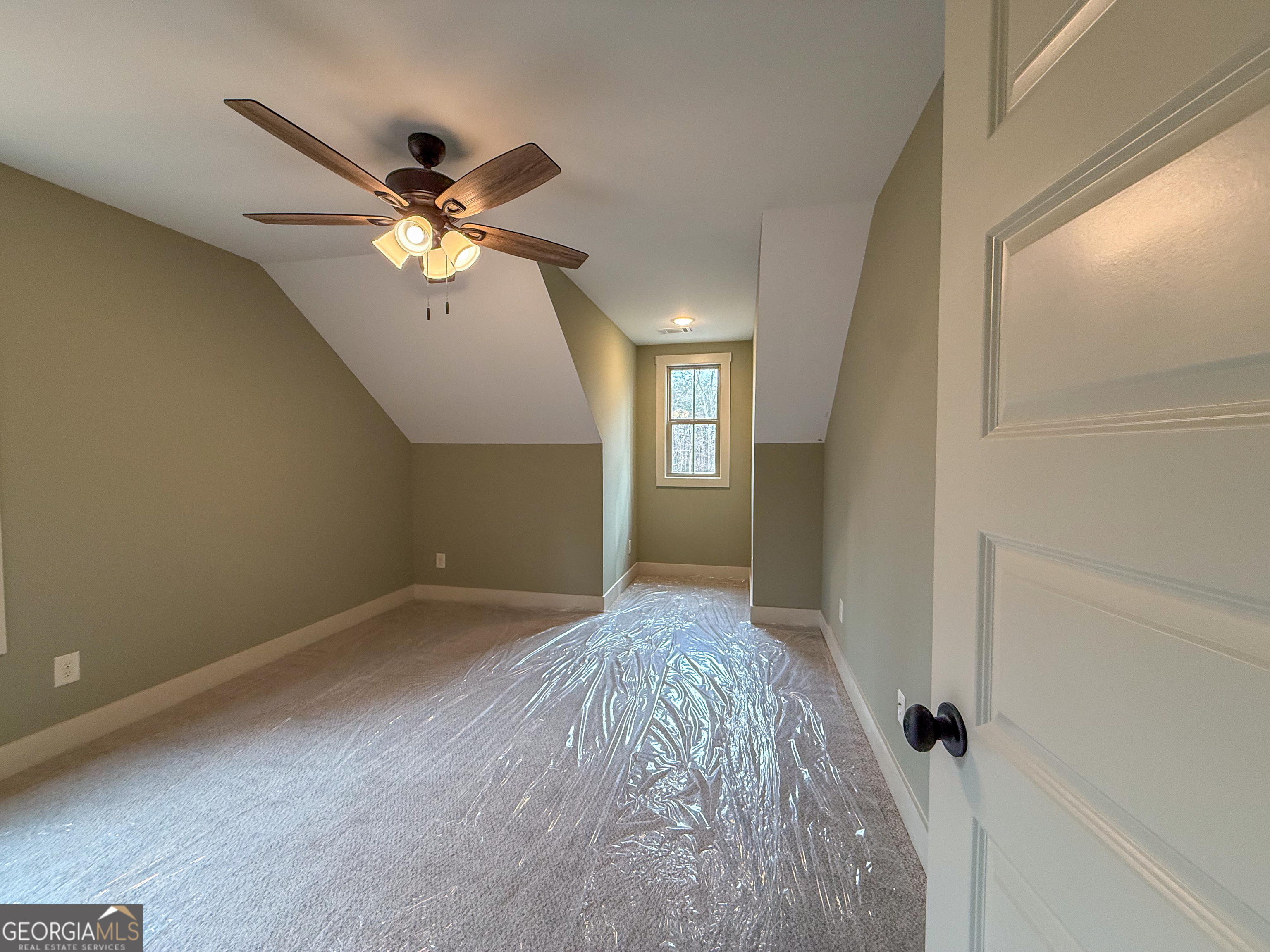 18 Creek Bend Point Cleveland, GA 30528 - Photo 12 of 37 wooden floor in an empty room with a window