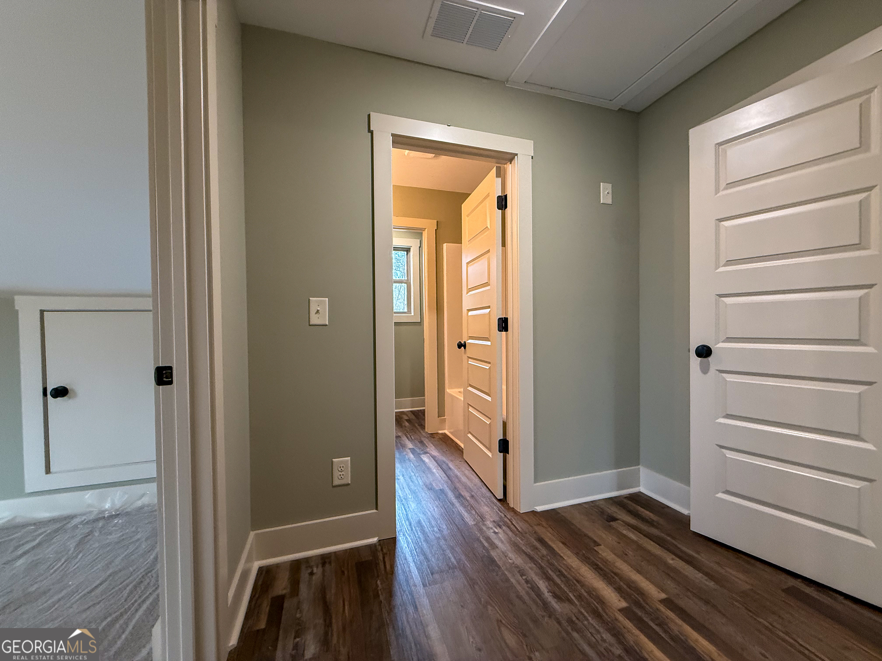 18 Creek Bend Point Cleveland, GA 30528 - Photo 16 of 37 a view of a hallway with wooden floor and closet