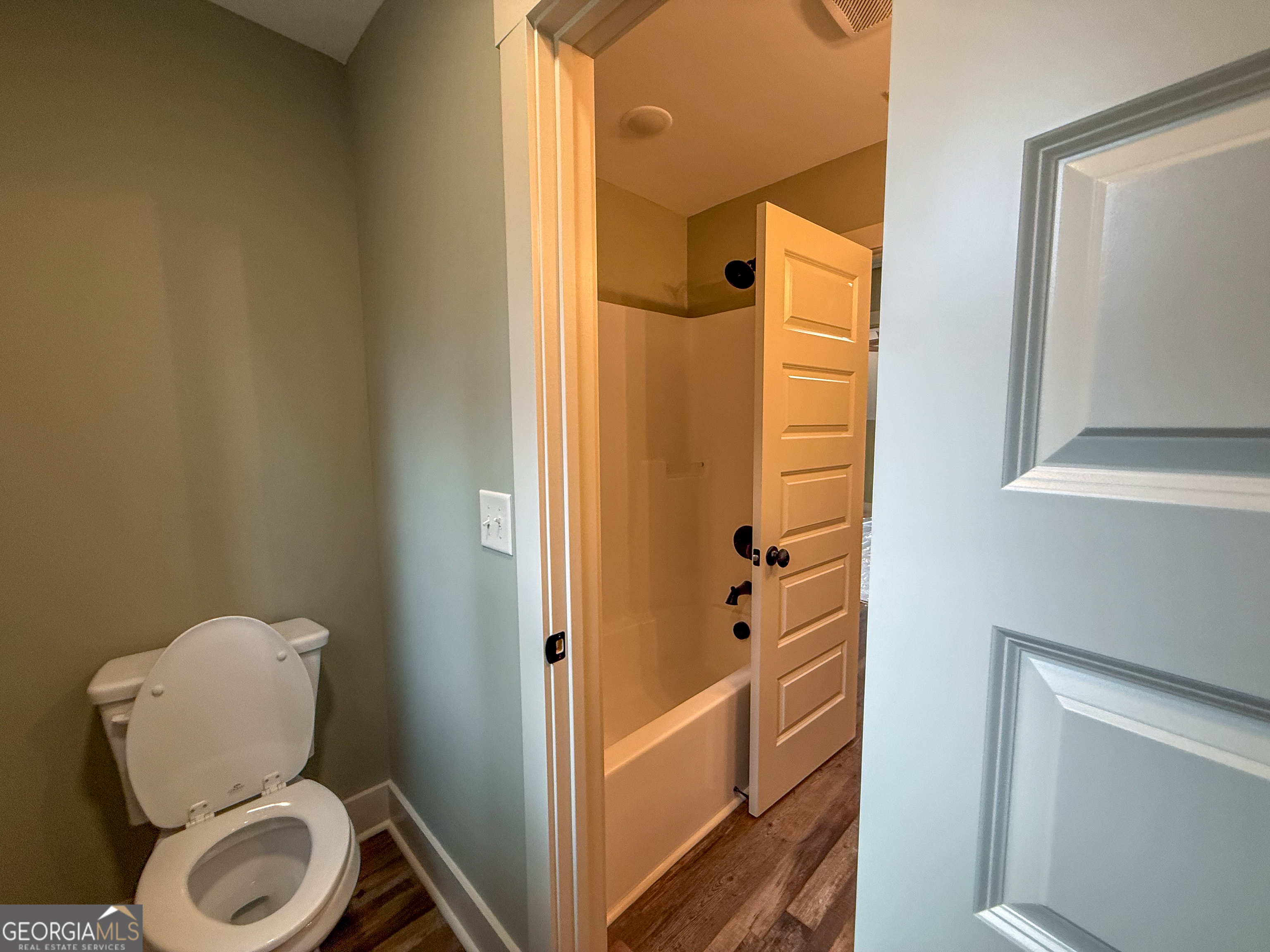 18 Creek Bend Point Cleveland, GA 30528 - Photo 19 of 37 a bathroom with a toilet and a shower