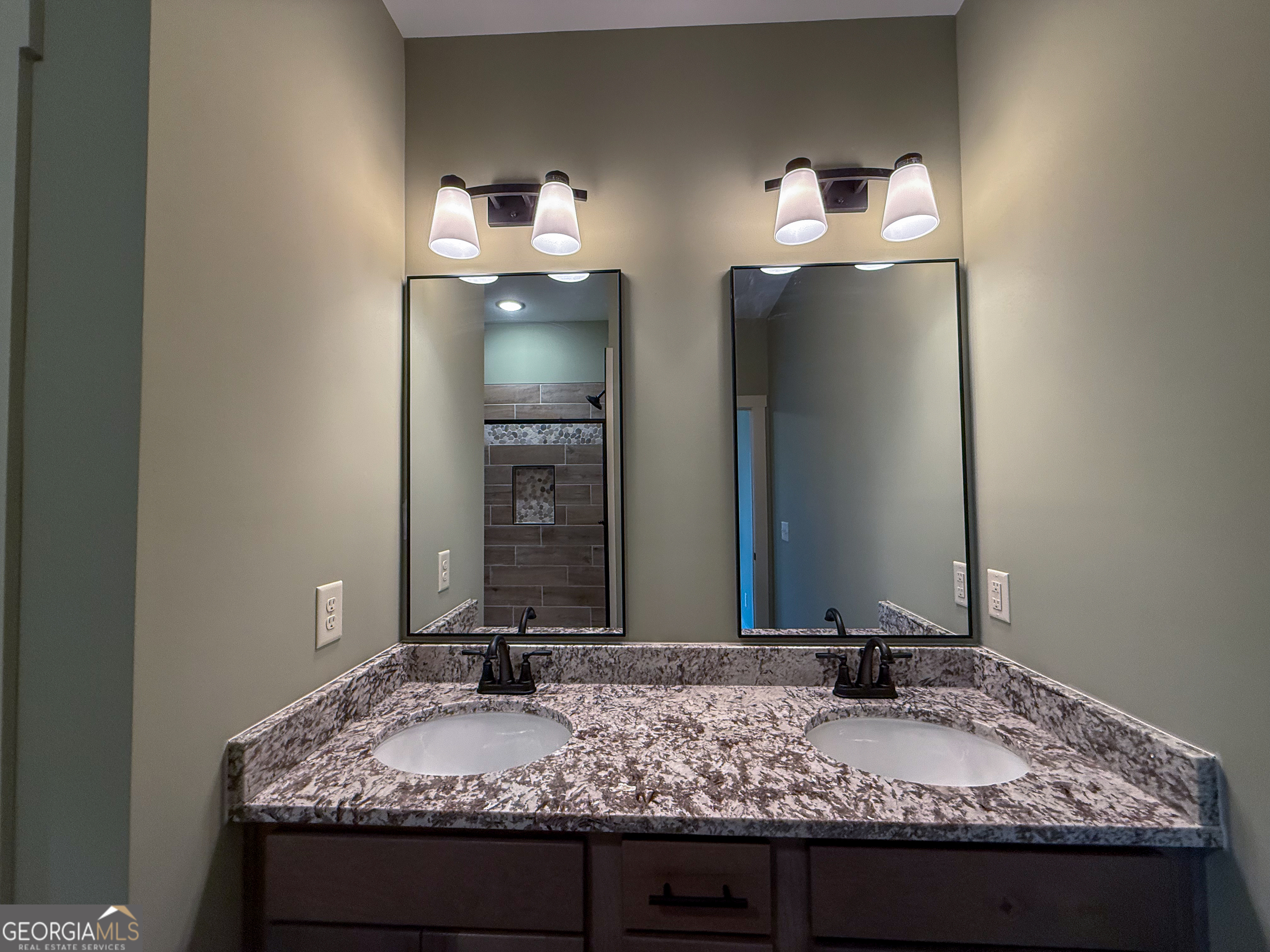 18 Creek Bend Point Cleveland, GA 30528 - Photo 25 of 37 a bathroom with a granite countertop sink and a mirror