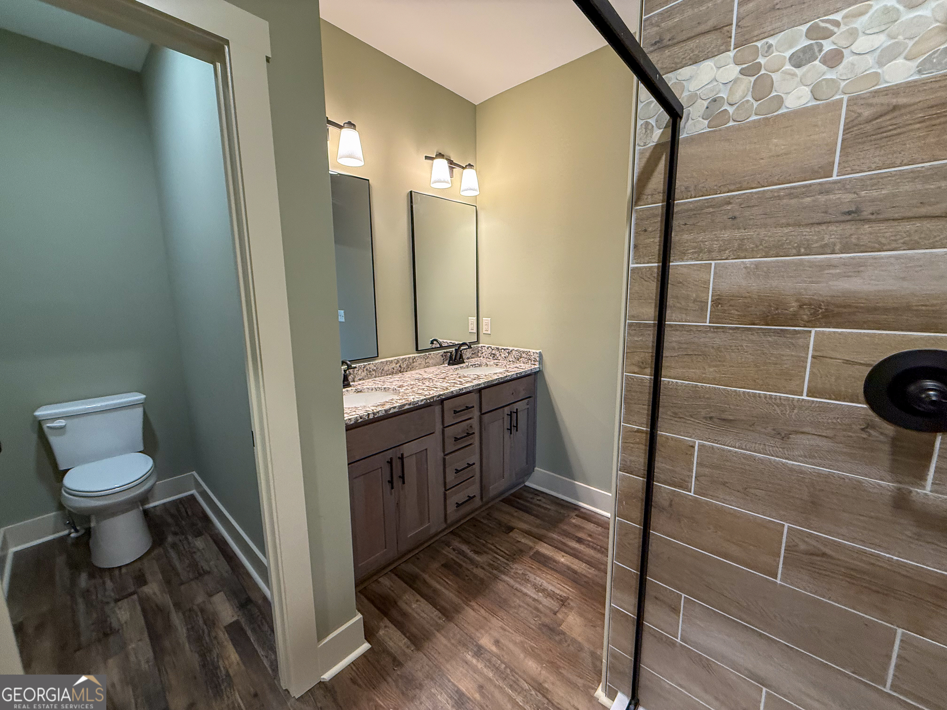 18 Creek Bend Point Cleveland, GA 30528 - Photo 27 of 37 a bathroom with a sink toilet and shower