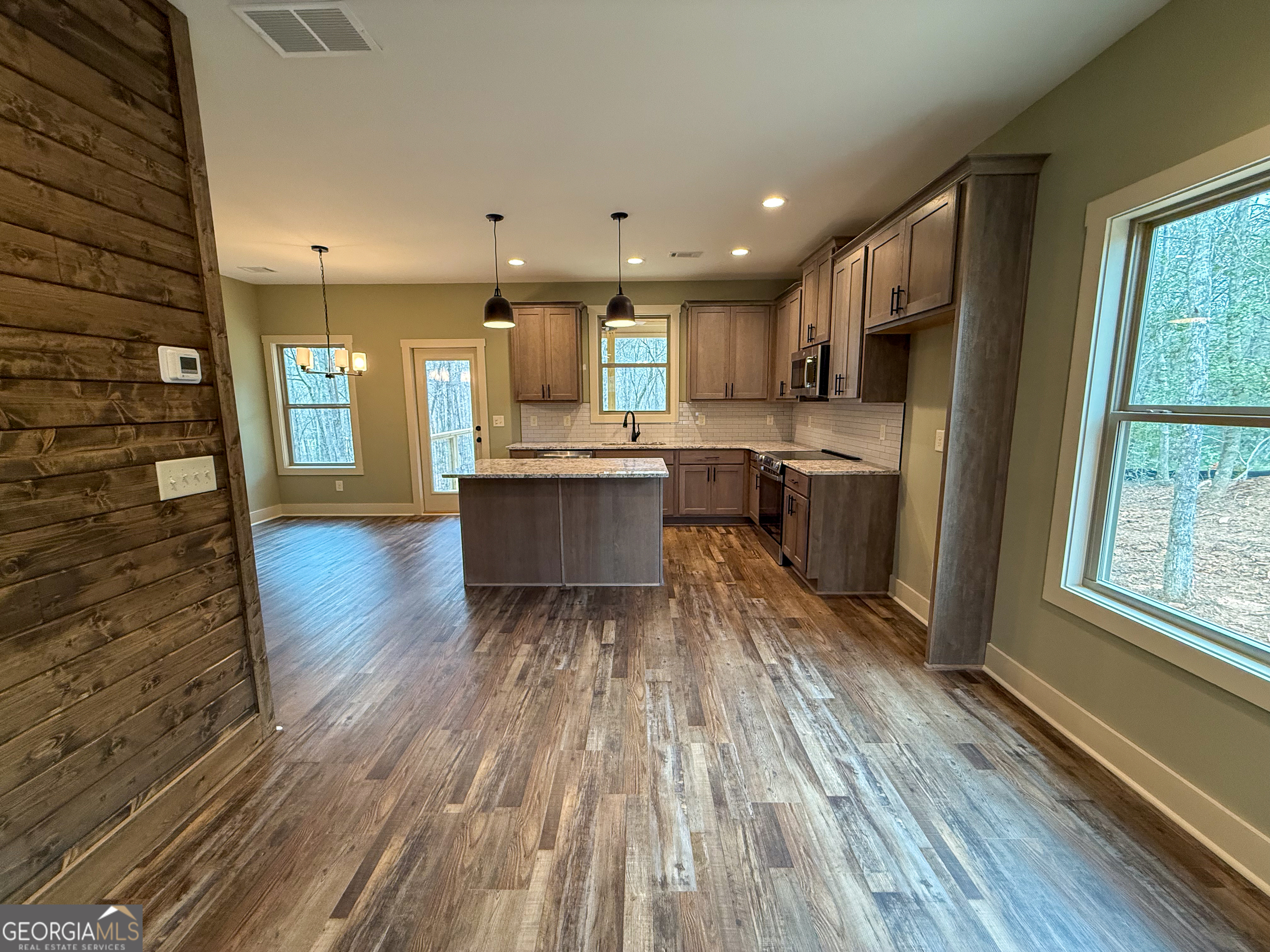18 Creek Bend Point Cleveland, GA 30528 - Photo 4 of 37 a view of kitchen with sink and wooden floor