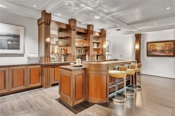 a kitchen with stainless steel appliances granite countertop a sink and cabinets