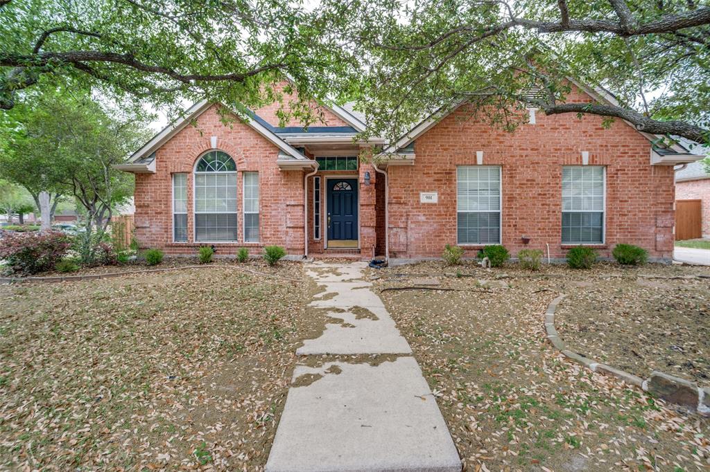 View of front of property with brick siding