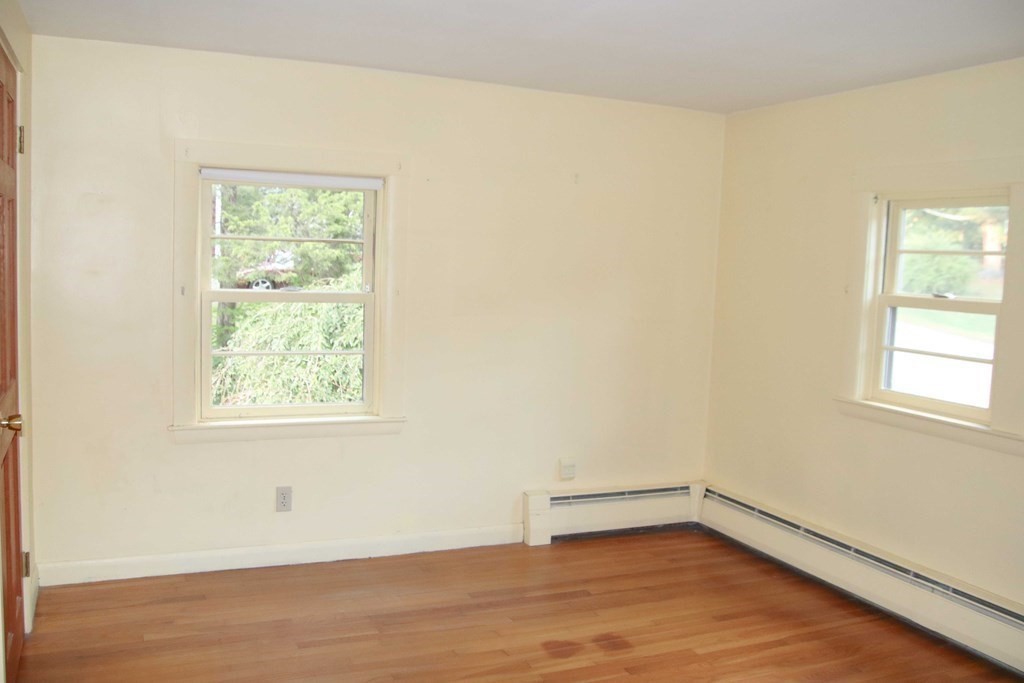 4 Cedarview Road Ipswich, MA 01938 - Photo 13 of 20 an empty room with wooden floor and windows