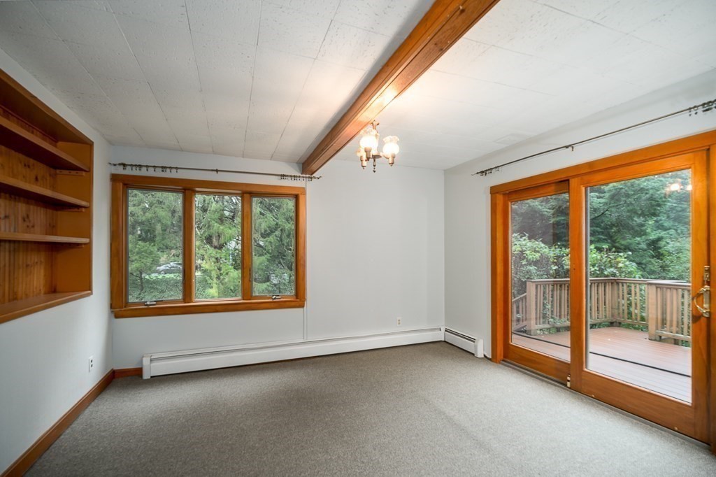 4 Cedarview Road Ipswich, MA 01938 - Photo 9 of 20 an empty room with wooden floor and windows