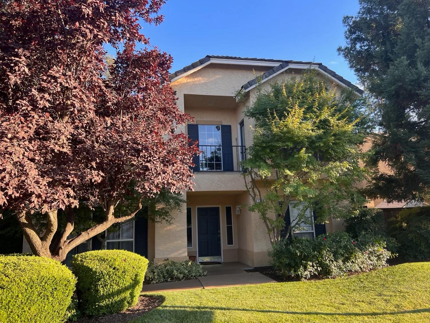 1230 Minarets Avenue Clovis, CA 93611 - Photo 2 of 19 a front view of a house with garden