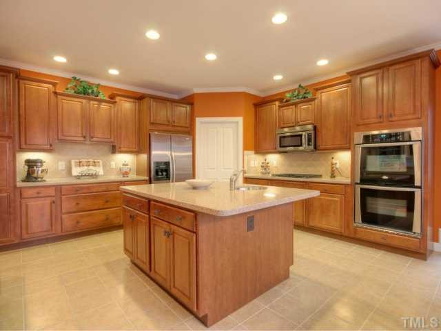 3 Highcross Court Raleigh, NC 27613 - Photo 10 of 25 Every cooks fantasy at your fingertips! Enjoy all the amenities that this kitchen as to offer the chef of the family! Double ovens, under cabinet lighting, recessed lighting, arched doorways, breakfast area and much more! Kitchen