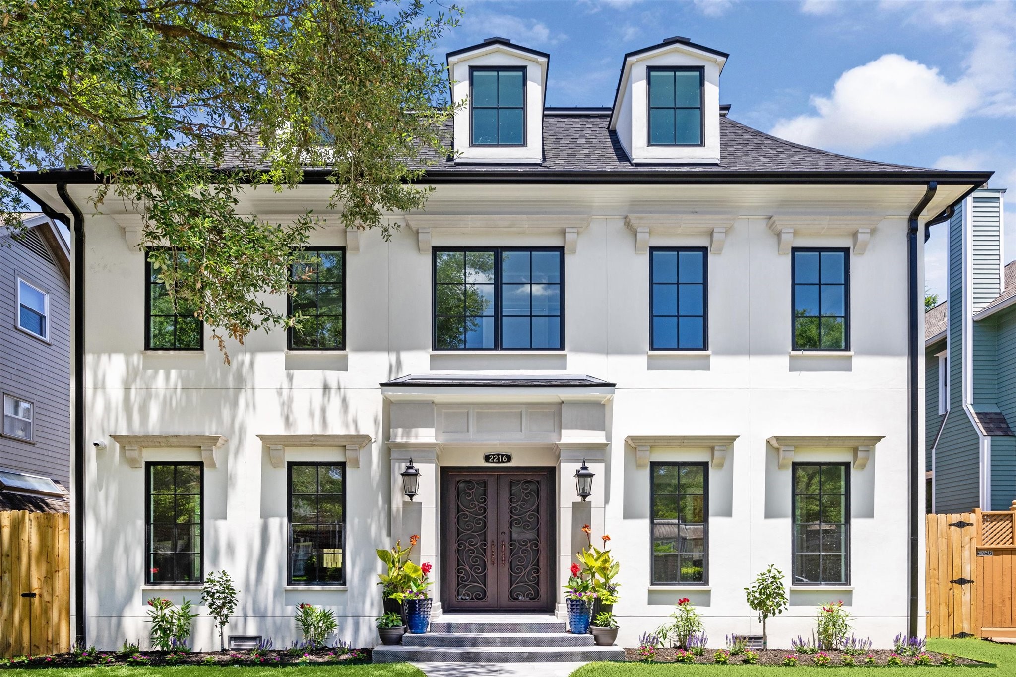 2216 Tangley Street Houston, TX 77005 - Photo 1 of 44 Welcome to 2216 Tangley Street! This incredible new construction 3 story home features a classic white facade with black-framed windows and third floor dormers.
