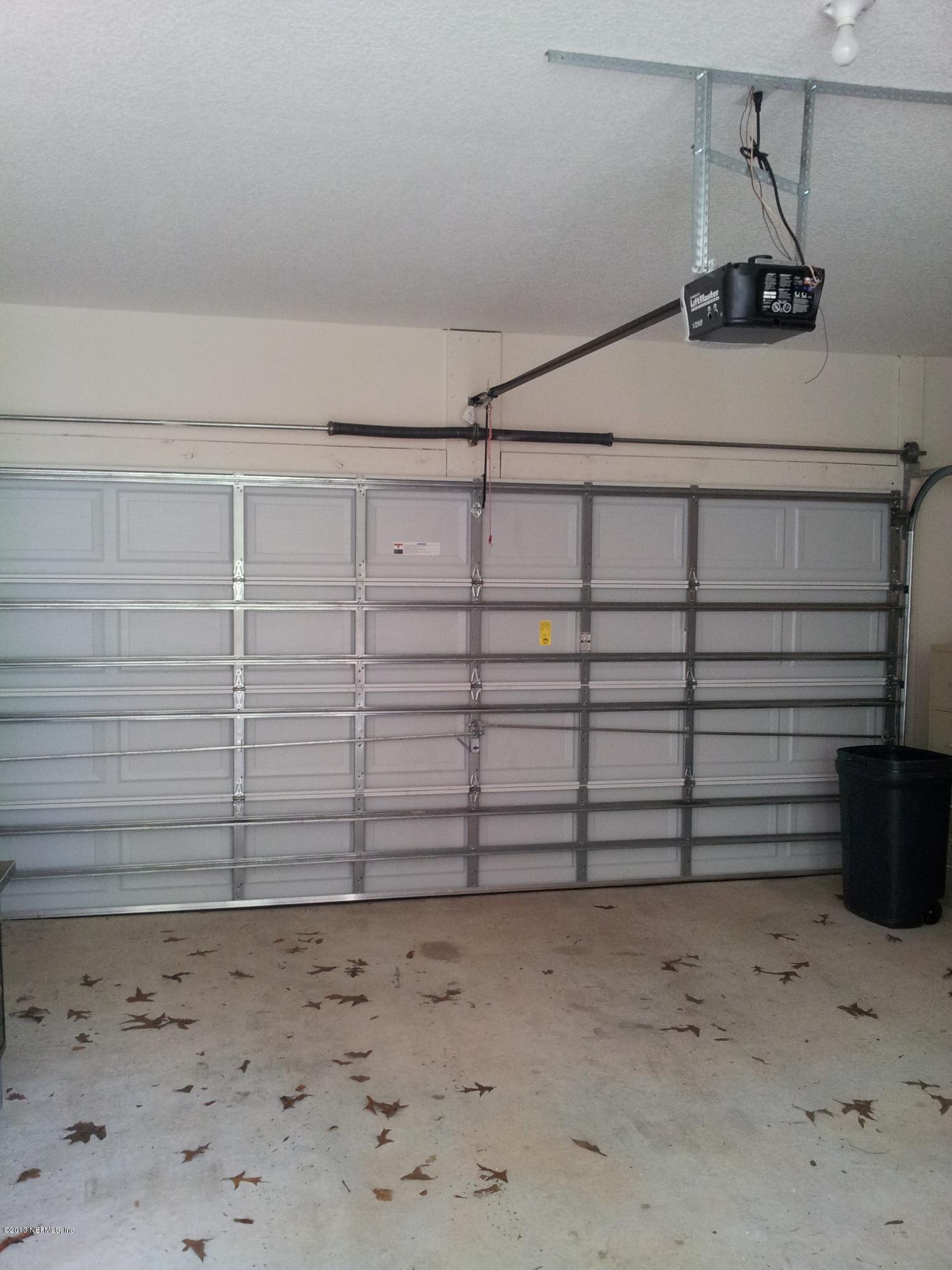 3162 Ravines Road Middleburg, FL 32068 - Photo 16 of 16 a view of a garage