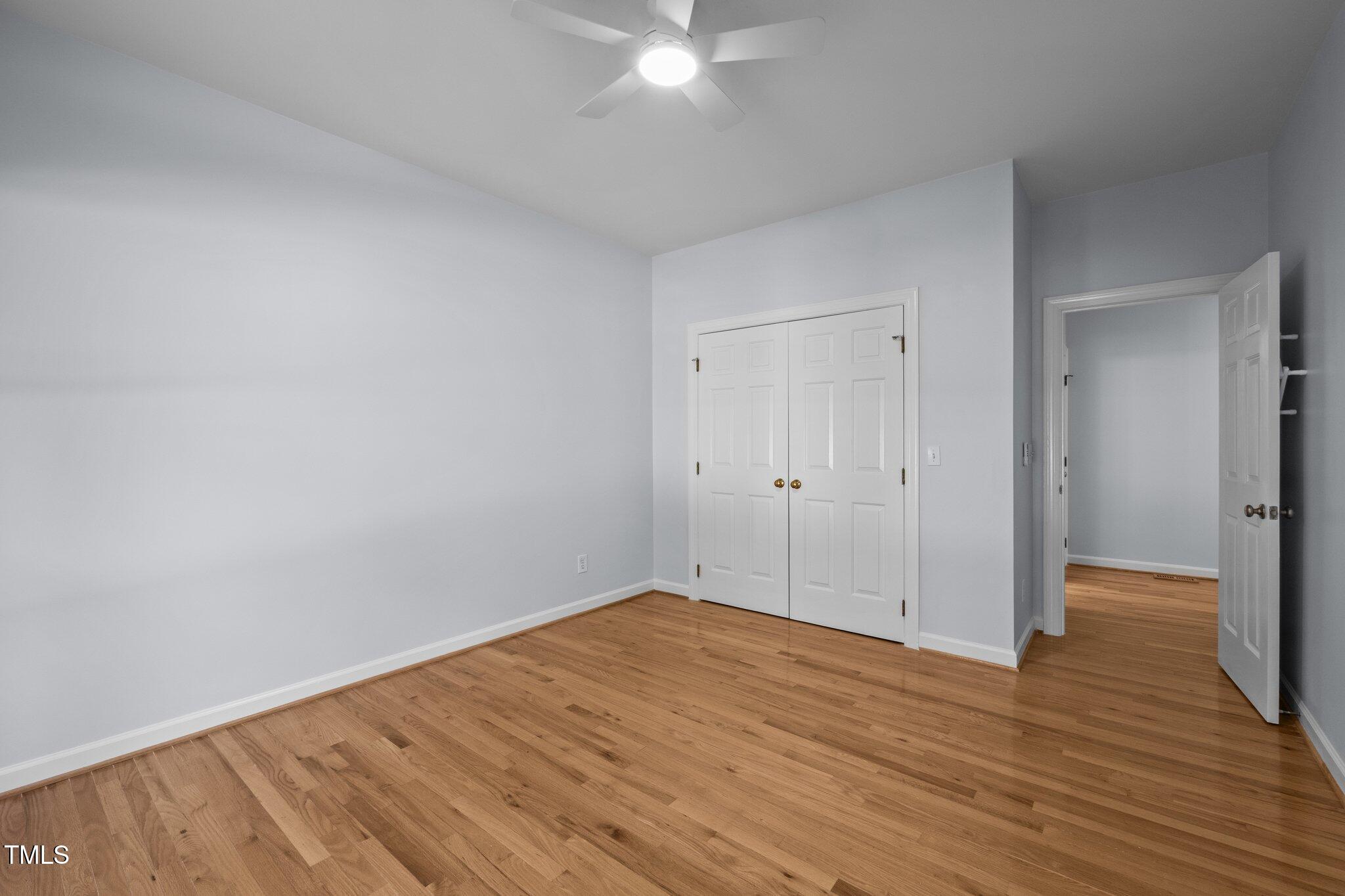 2123 Fountain Ridge Road Chapel Hill, NC 27707 - Photo 26 of 46 a view of an empty room with wooden floor