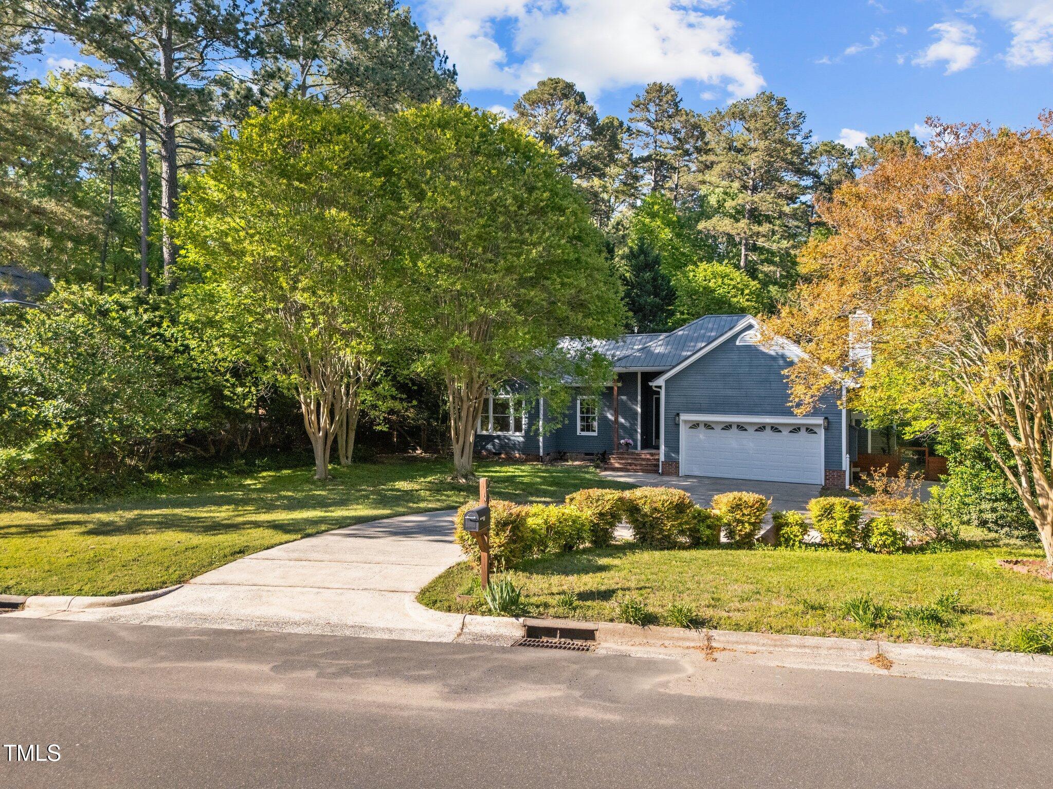 2123 Fountain Ridge Road Chapel Hill, NC 27707 - Photo 39 of 46 a view of a house with a yard street and trees