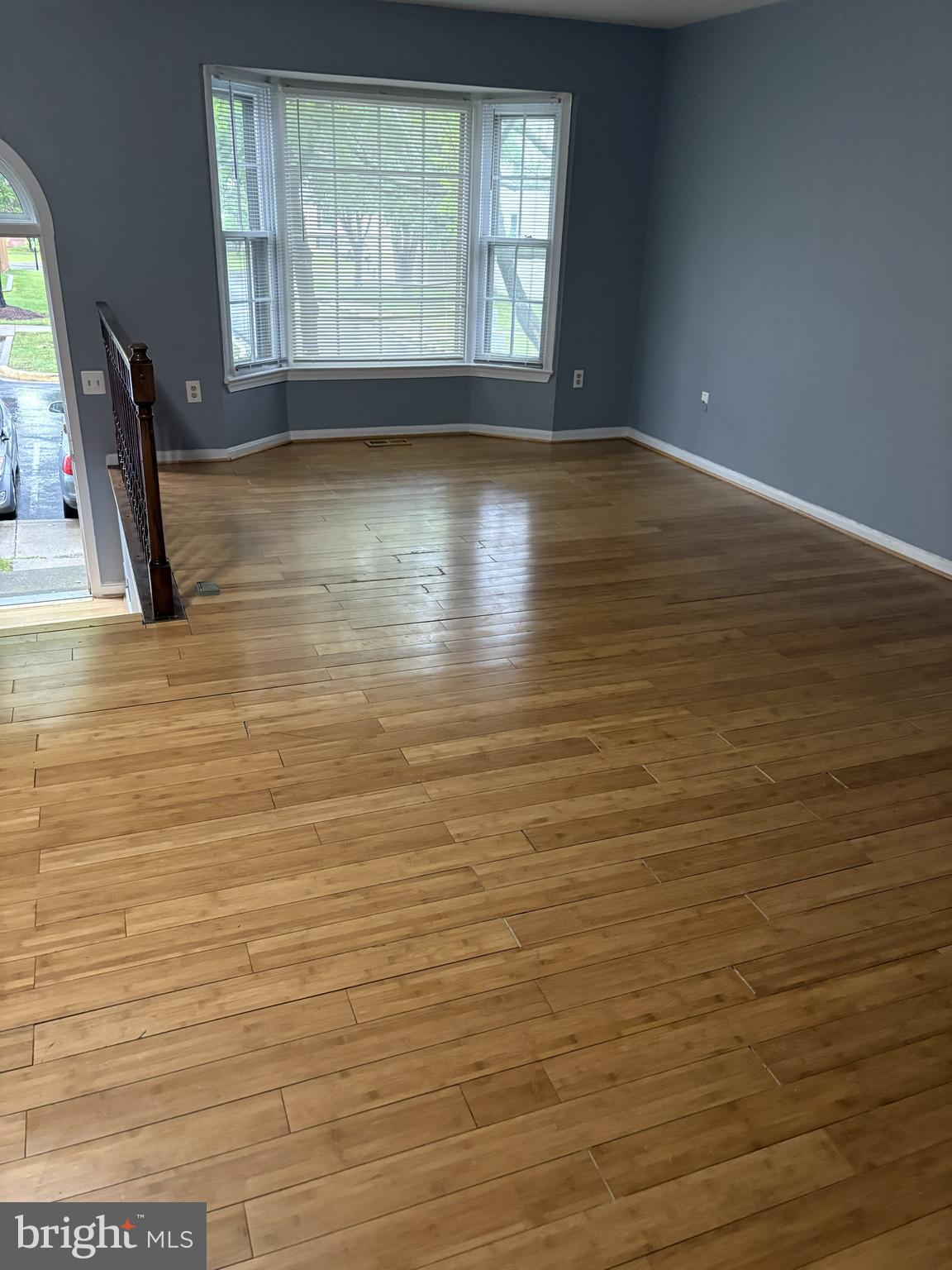 13242 Stravinsky Terrace Silver Spring, MD 20904 - Photo 4 of 11 wooden floor in an empty room with a window