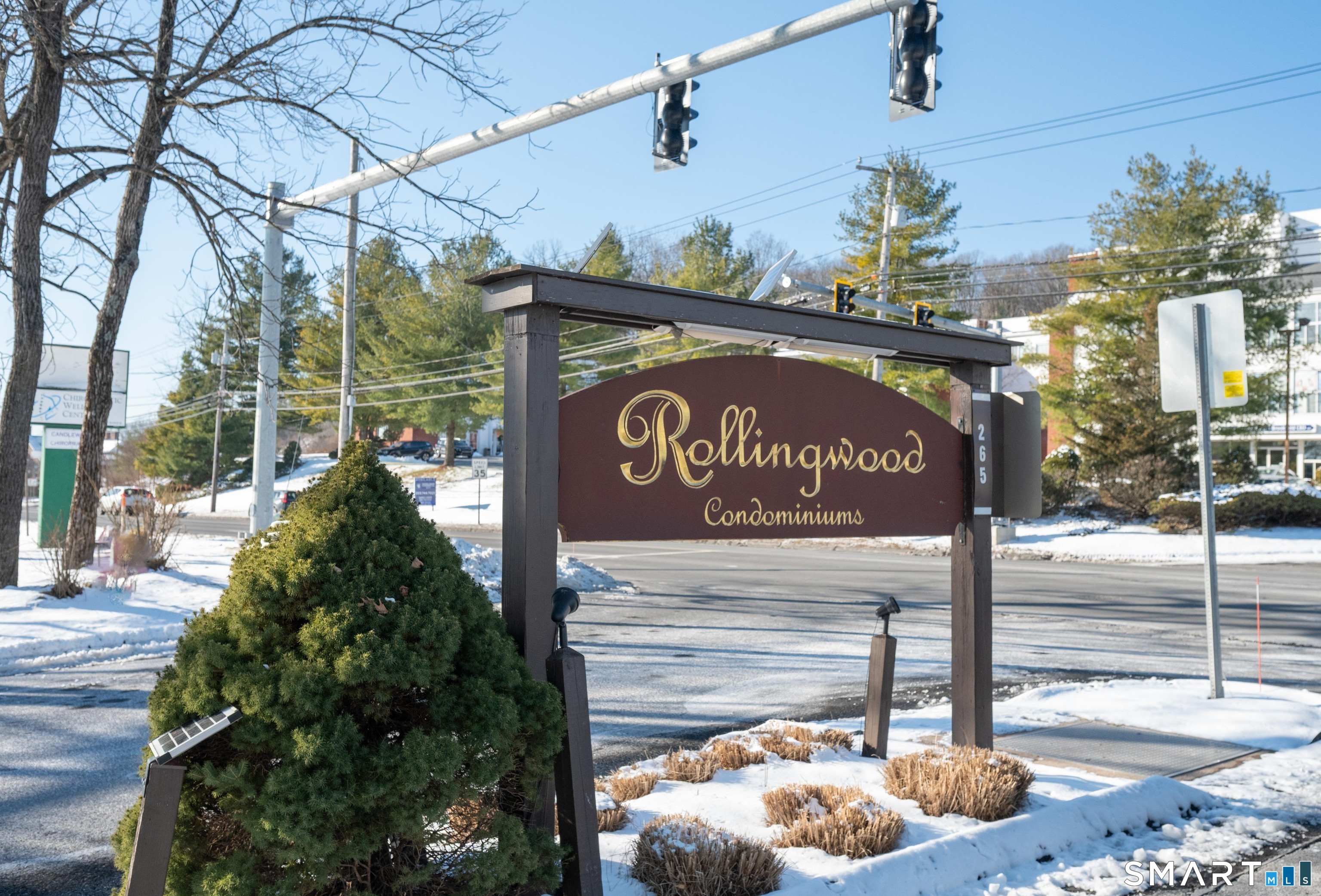 4 Arlington Court, Unit 4 Brookfield, CT 06804 - Photo 21 of 21 a sign on the side of a street