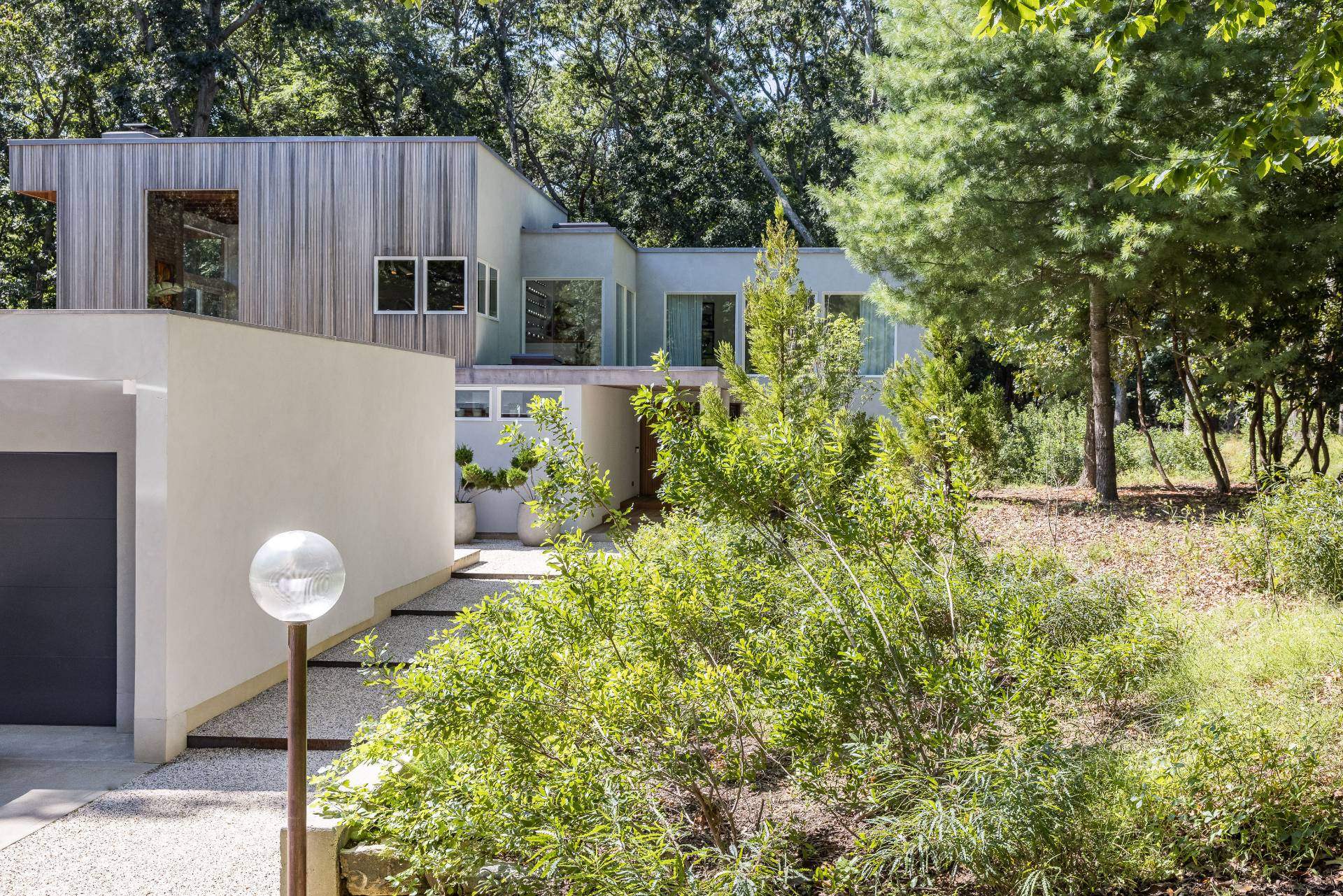 216 Bull Path East Hampton, NY 11937 - Photo 2 of 30 a view of a back yard of the house