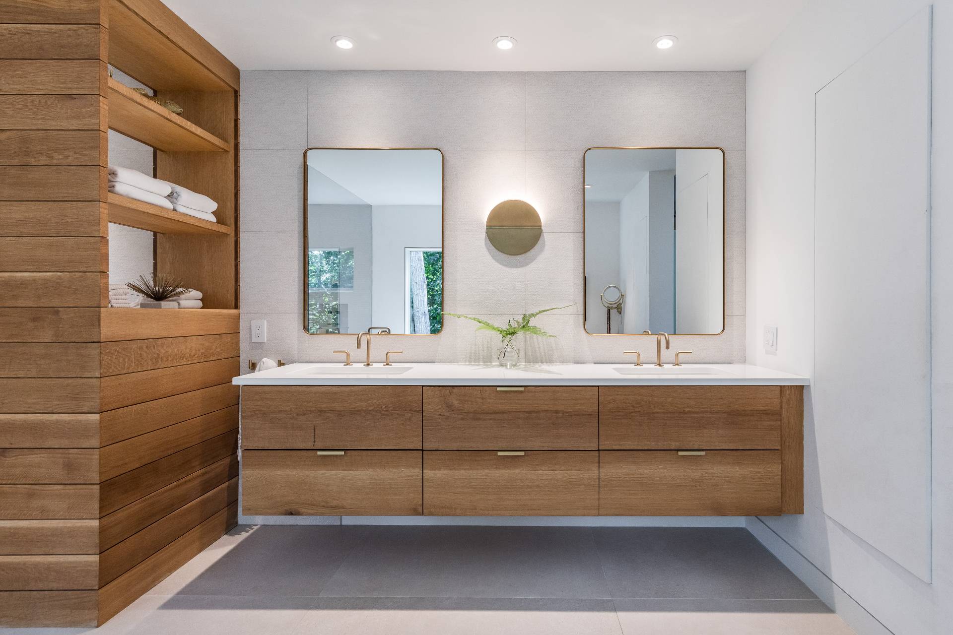 216 Bull Path East Hampton, NY 11937 - Photo 13 of 30 a bathroom with a double vanity sink and a mirror