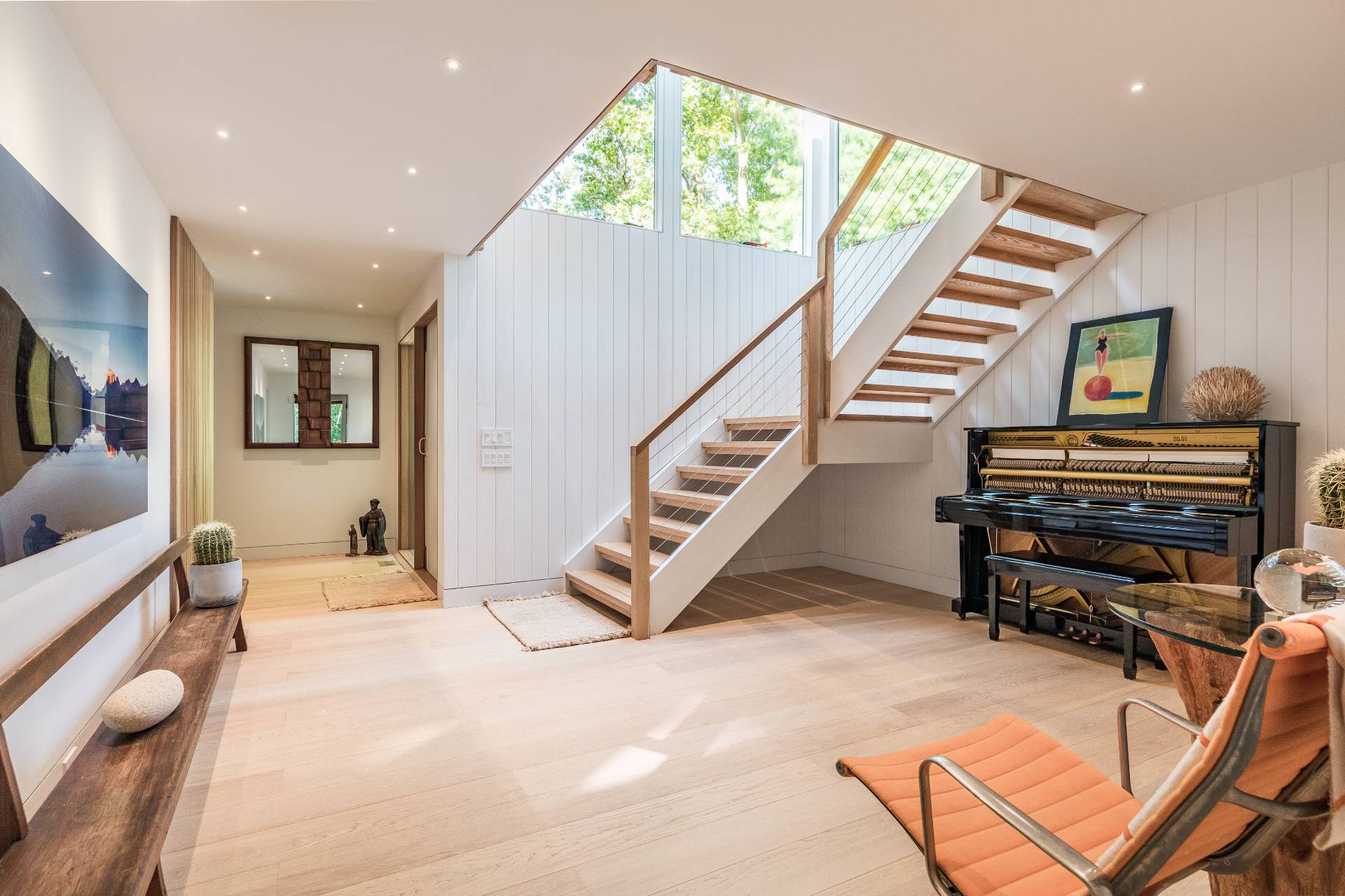 216 Bull Path East Hampton, NY 11937 - Photo 15 of 30 a bedroom with furniture and a wooden floor