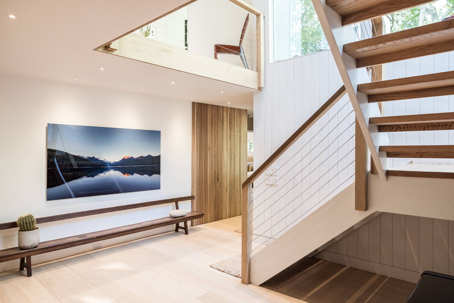 216 Bull Path East Hampton, NY 11937 - Photo 16 of 30 a view of staircase with a rug and a window